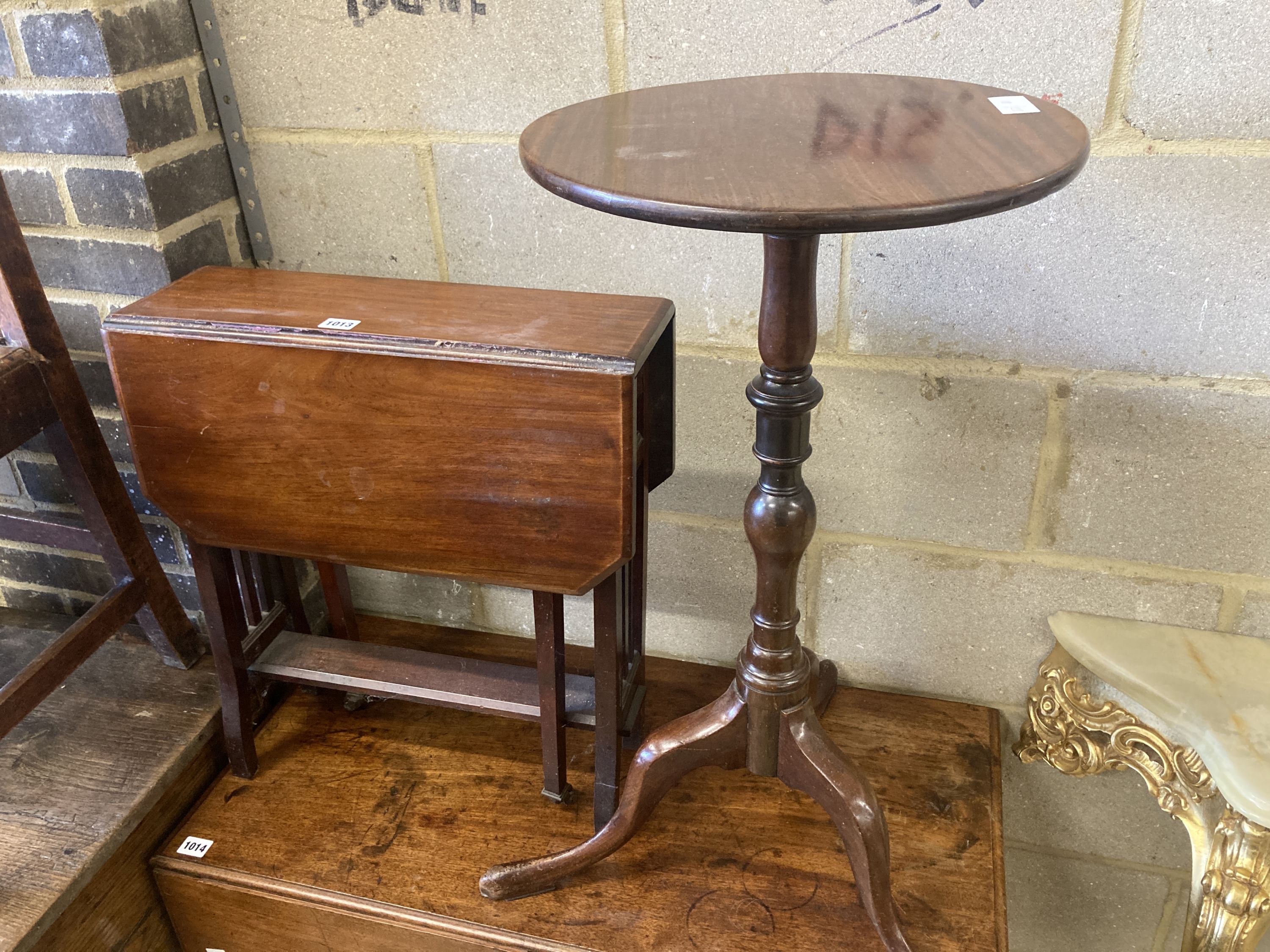 An early 20th century mahogany tripod wine table, 38cm diameter, height 74cm, together with an Edwardian mahogany Sutherland table